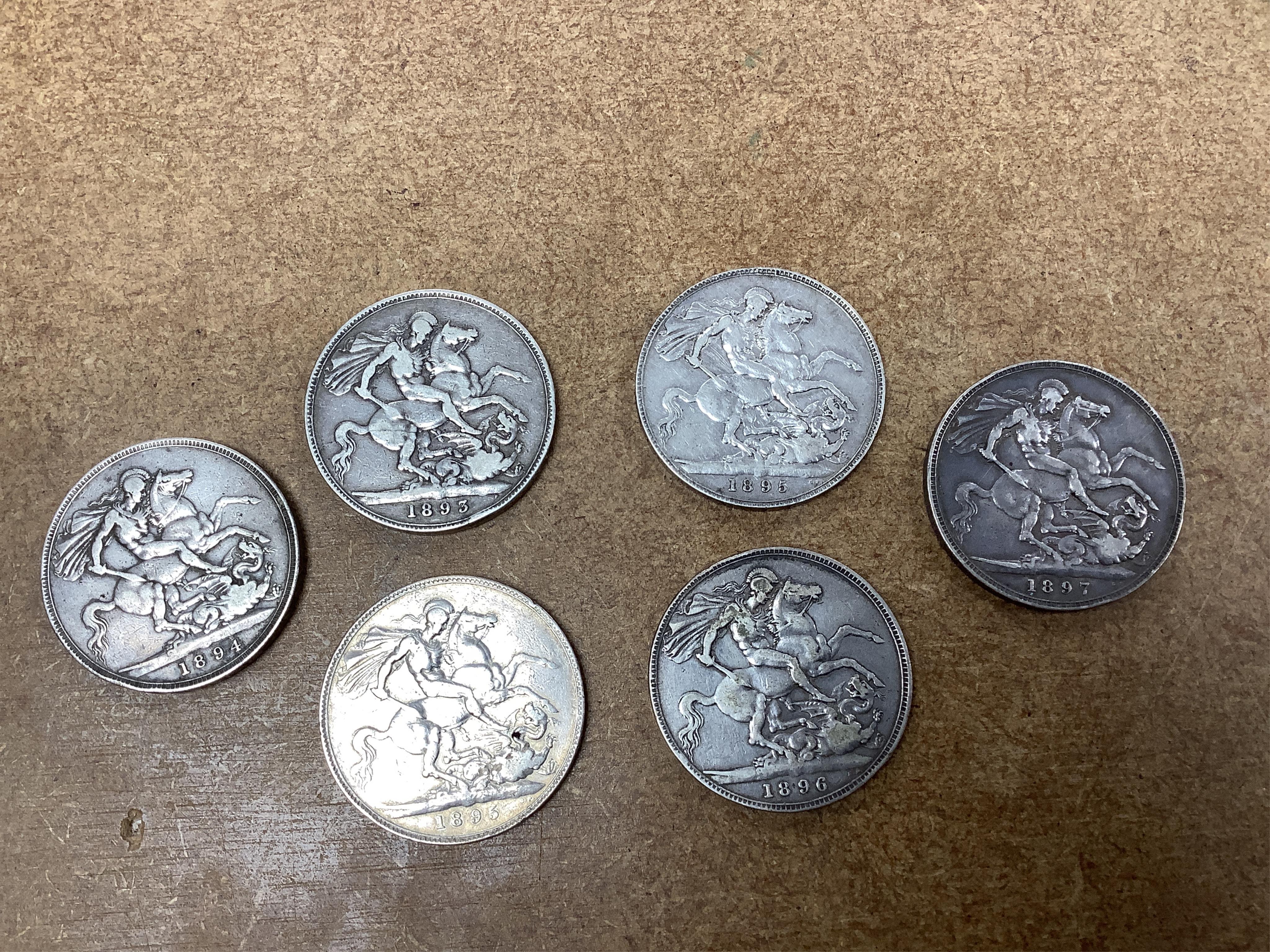 British silver coins, Victoria to George VI, eighteen crowns;, two 1889, 1890, 1891, 1892, two 1893, 1894 to 1895, 1896, 1897, 1898, four 1935 and 1937, ranging from fine to about EF